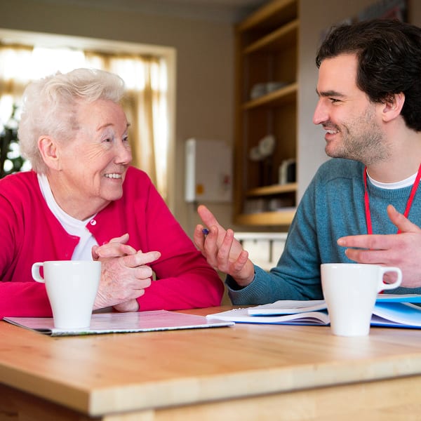 Lady talking with a caseworker